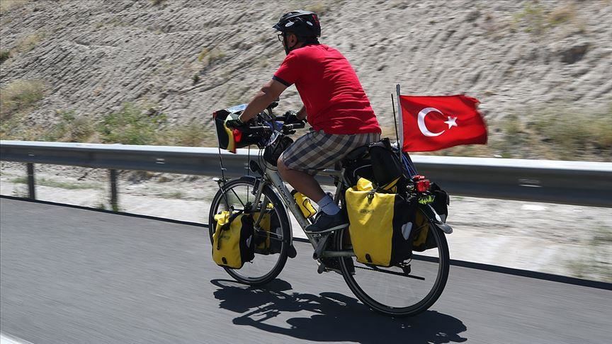 Turk bikes 5 nations to remember martyrs of foiled coup