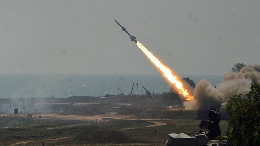 North Korea fires projectiles into open waters