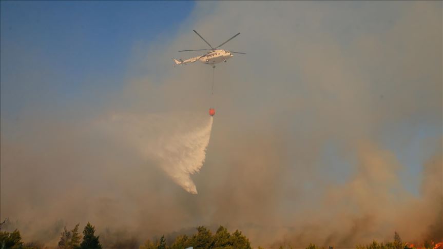 Firefighters battling to put out forest fires in Turkey