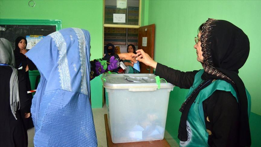 Afghan election body warns against early victory claims