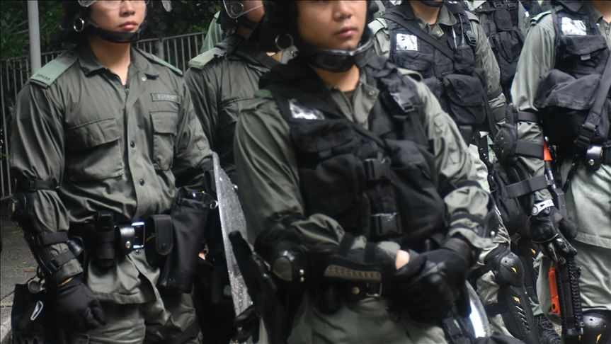 Protestors' arrow leave policeman wounded in Hong Kong