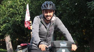 Turkish man bikes to raise awareness for stroke victims