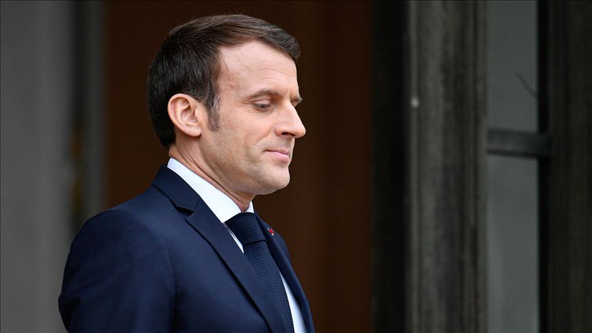 French police evacuate Macron from theatre amid protest
