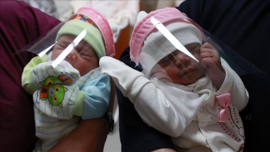 Newborns in face shields because of coronavirus concerns