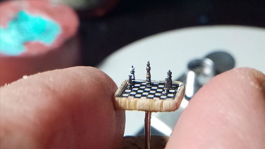 Turkey: Micro-sculptor’s chess set small as thumbtack
