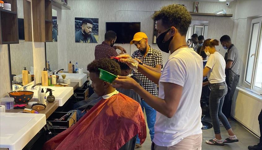 African barber in Turkey undaunted by coronavirus
