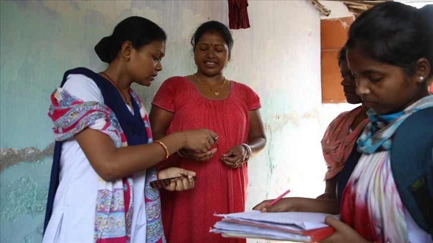 India: Women who fight coronavirus face 2-way risk
