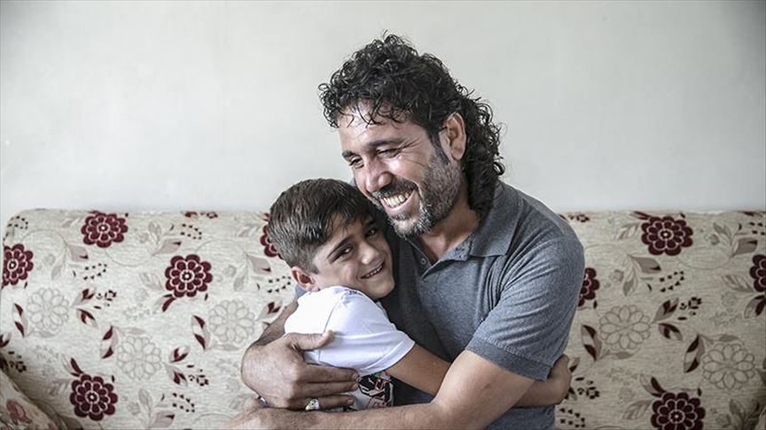 Turkey: Father, son reunite at Syrian border crossing
