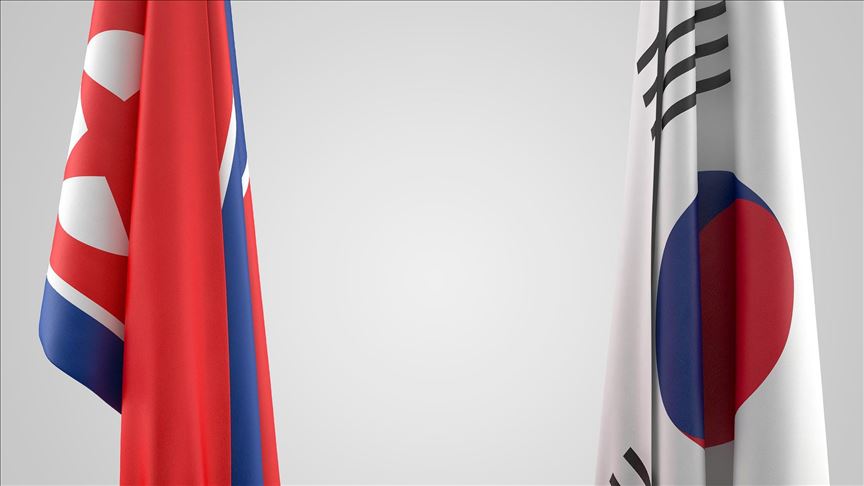 North Korean defector crosses drain, river, says South