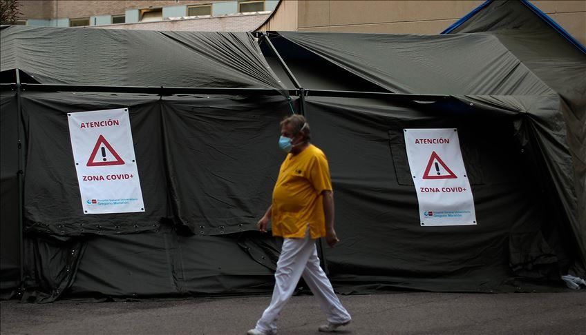 Spain counts more than 100,000 virus cases in 2 weeks