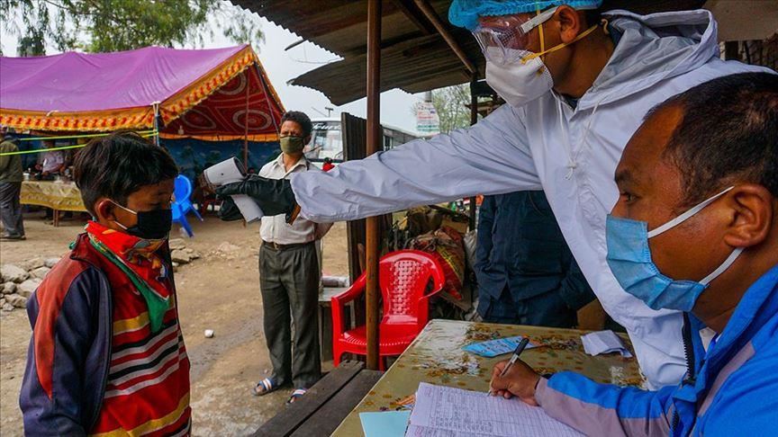 Nepal's virus cases spike amid calls for easing curbs