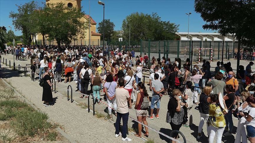 Spain: 53 schools report virus cases after reopening