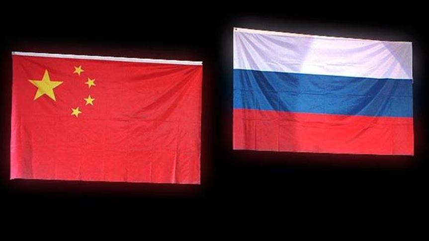 Putin open to military alliance between Russia, China