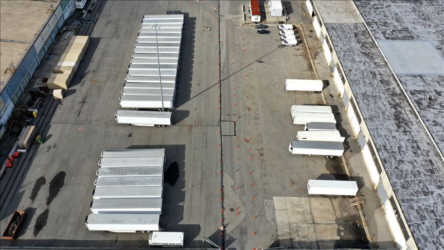 Anadolu Agency films trucks with NYC virus bodies