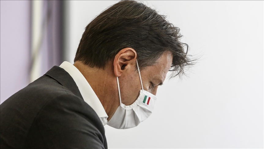 Italy: Bowing to crisis, prime minister steps down