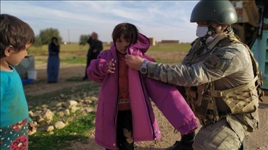 Turkish soldiers distribute aid in northern Syria