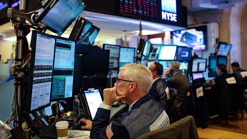 US stocks end higher as volatility lowest in over year