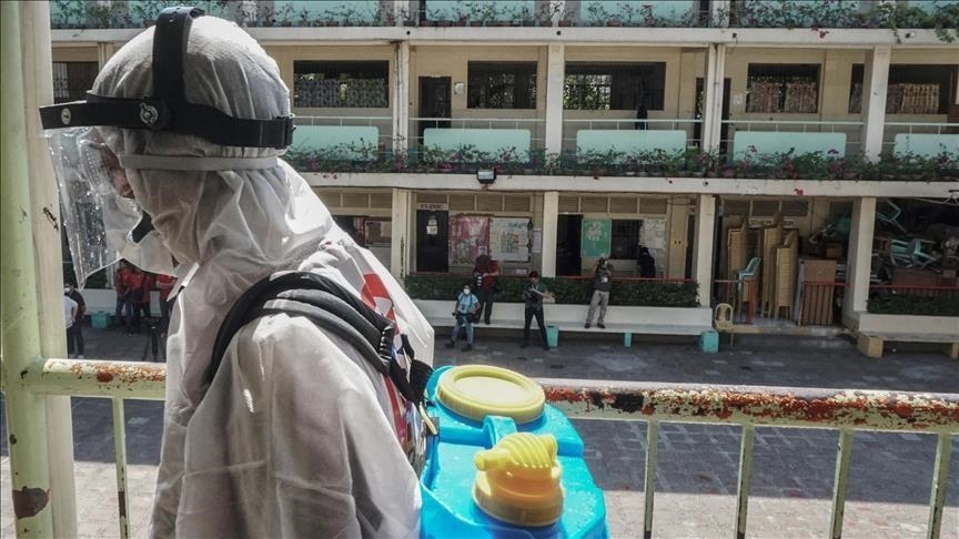 Philippines to double daily tests as virus surges