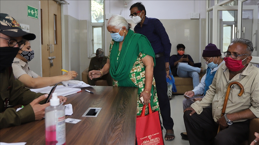 India hits new record high of nearly 169,000 daily virus cases
