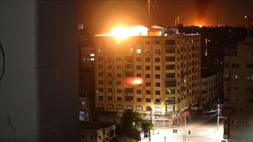 Israeli warplanes destroy 9-story building in Gaza