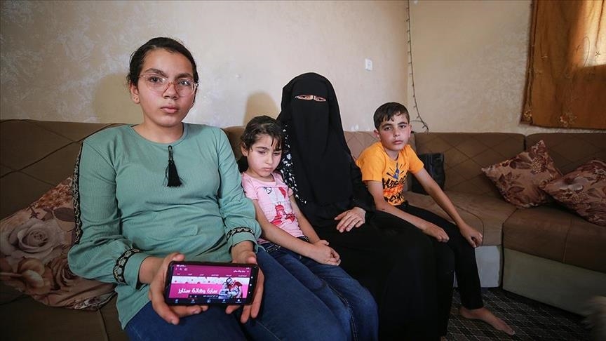 Gazan siblings mourn for father killed in Israeli air strikes