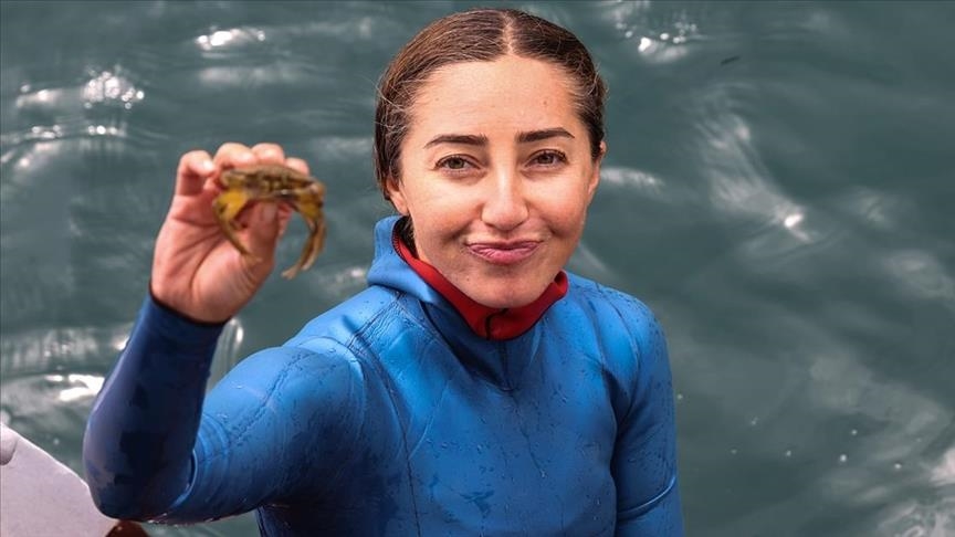 World record holder Turkish diver urges action to clear seas of mucilage