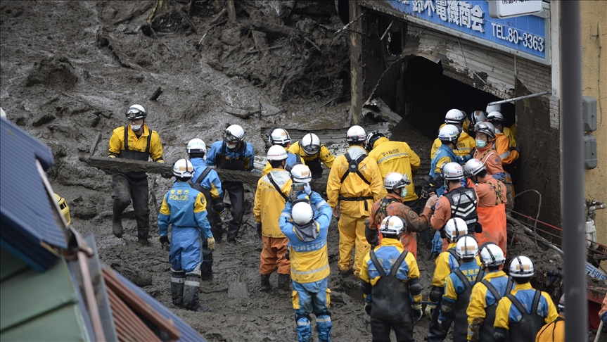 Rescuers race to find 80 missing after Japan landslides