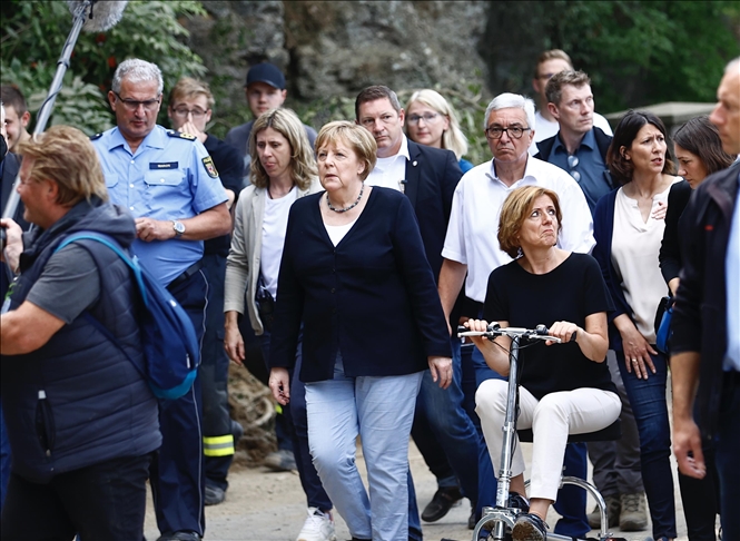 Germany's Merkel tours 'frightening' flood-stricken region