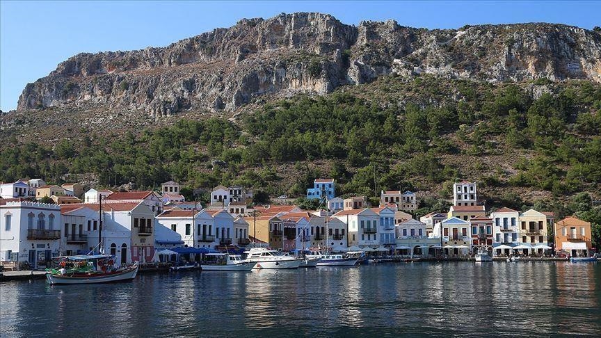 Nightlife music banned to fight virus, Greek island falls silent