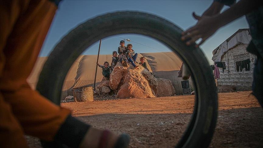 Civilians sheltered in Syrian refugee camps mark Muslim holiday despite difficulties