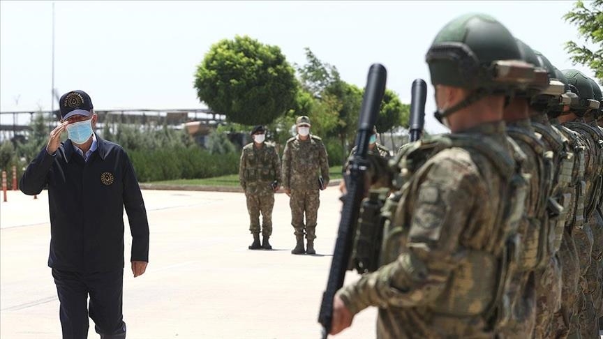 Turkey's defense chief inspects military post along Syrian border