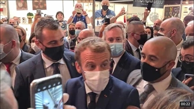 French President Macron pelted with egg at trade fair