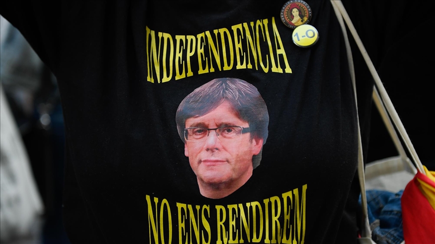 Catalan separatist leader Puigdemont walks free from Italian court