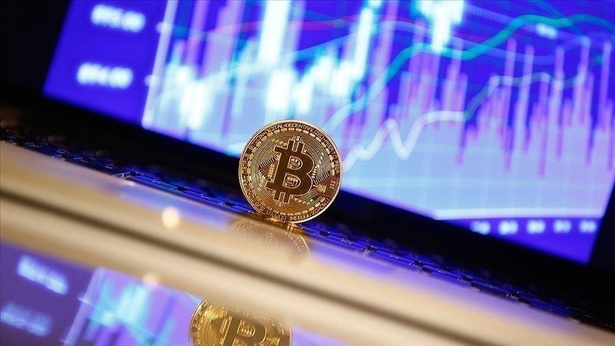 Bitcoin hits new all-time high of $66K after ETF