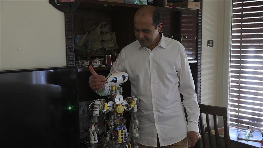 Afghan inspires other refugees with mini robot creation in Greece