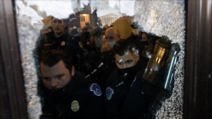 US Capitol rioter sentenced to longest term yet as 'Shaman' awaits