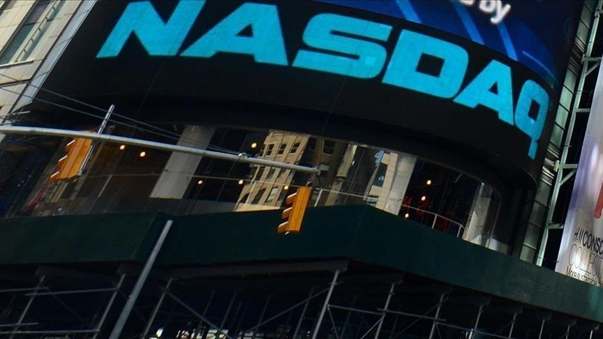 Nasdaq closes higher Dow S P 500 end in negative territory