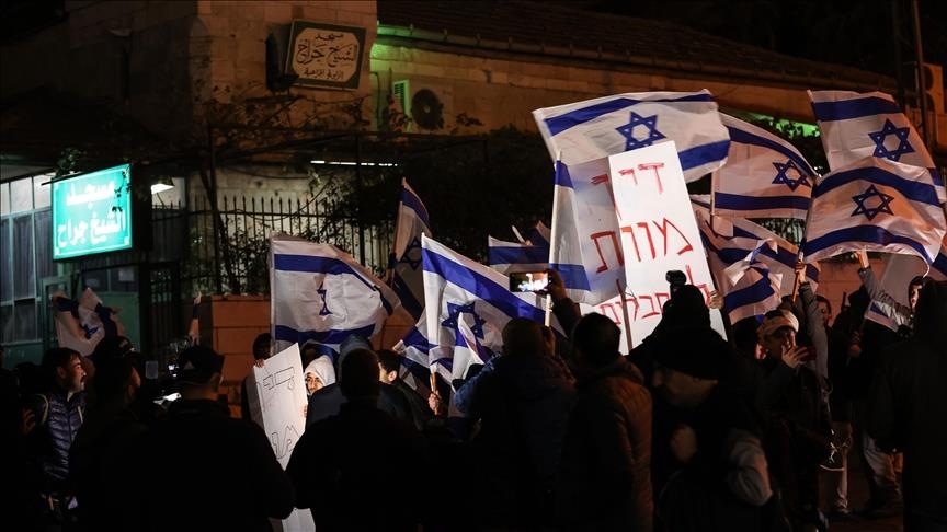 Israeli settlers march in East Jerusalem’s Sheikh Jarrah neighborhood