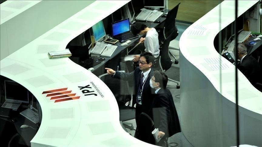Asian markets close week mixed, Europe mostly down
