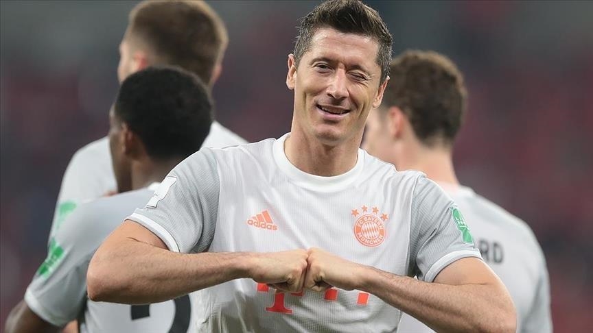 Lewandowski makes history as Bayern stay atop with win in Bundesliga