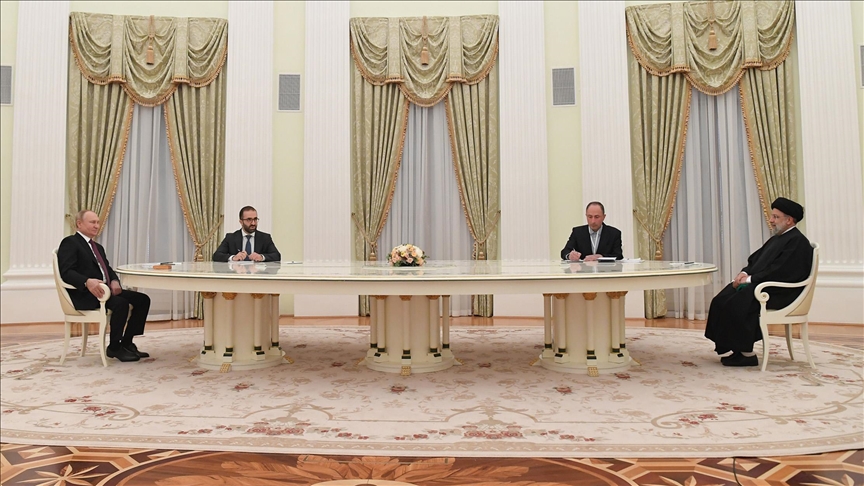 Russian president holds 1st face-to-face meeting with new Iranian counterpart