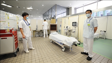 Health sector strained as Japan’s virus cases hit new peak