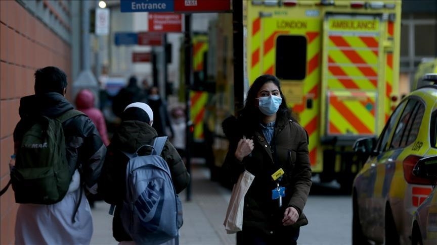 England eases virus restrictions, claiming success in curbing omicron spread