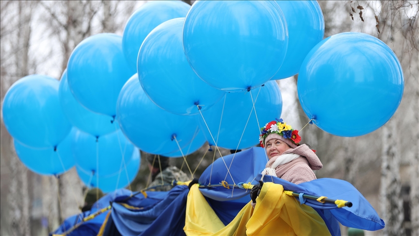 Ukrainian activists keep flag waving over separatist-held territories