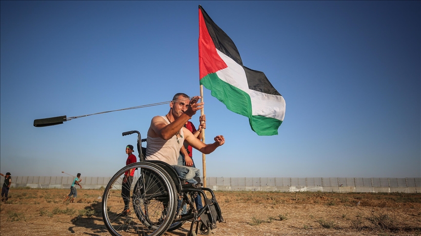 "الأشقر"..لم تمنعه إعاقته من المشاركة في الفعاليات الوطنية الفلسطينية (تقرير)
