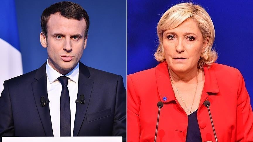 Macron sails through in 1st round of presidential election ahead of far-right candidate Le Pen