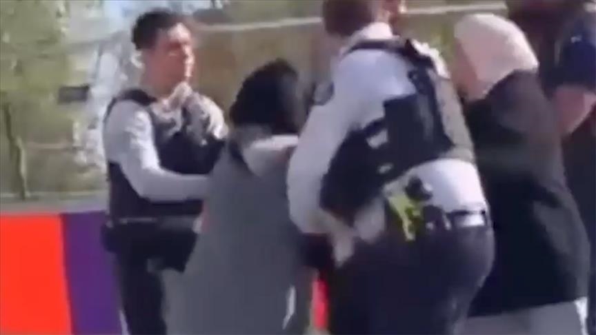 Investigation opens in France into police beating of women in headscarves Investigation opens in France into police beating of women in headscarves