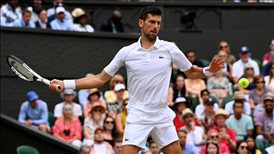 Top-seeded Djokovic comes from 2 sets down to advance at Wimbledon