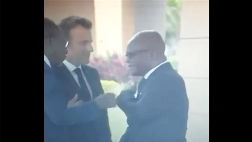 Video shows Benin's top diplomat cleaning shoulder after being touched by Macron