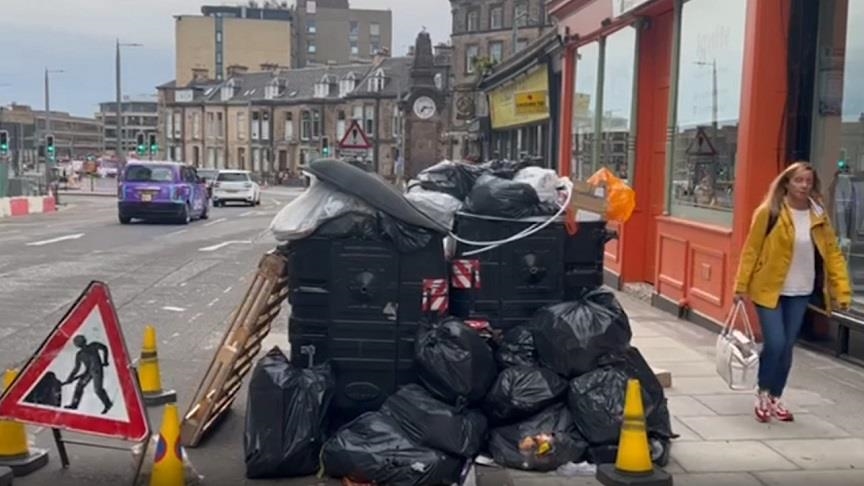 Edinburgh littered with teeming rubbish bins as workers strike over pay